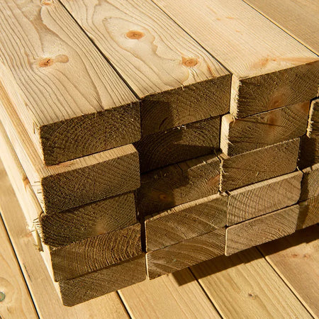 Stack of 47mm x 200mm C24 regularised treated timber boards