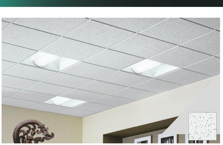 Fissured mineral fibre suspended ceiling tile installed in commercial ceiling
